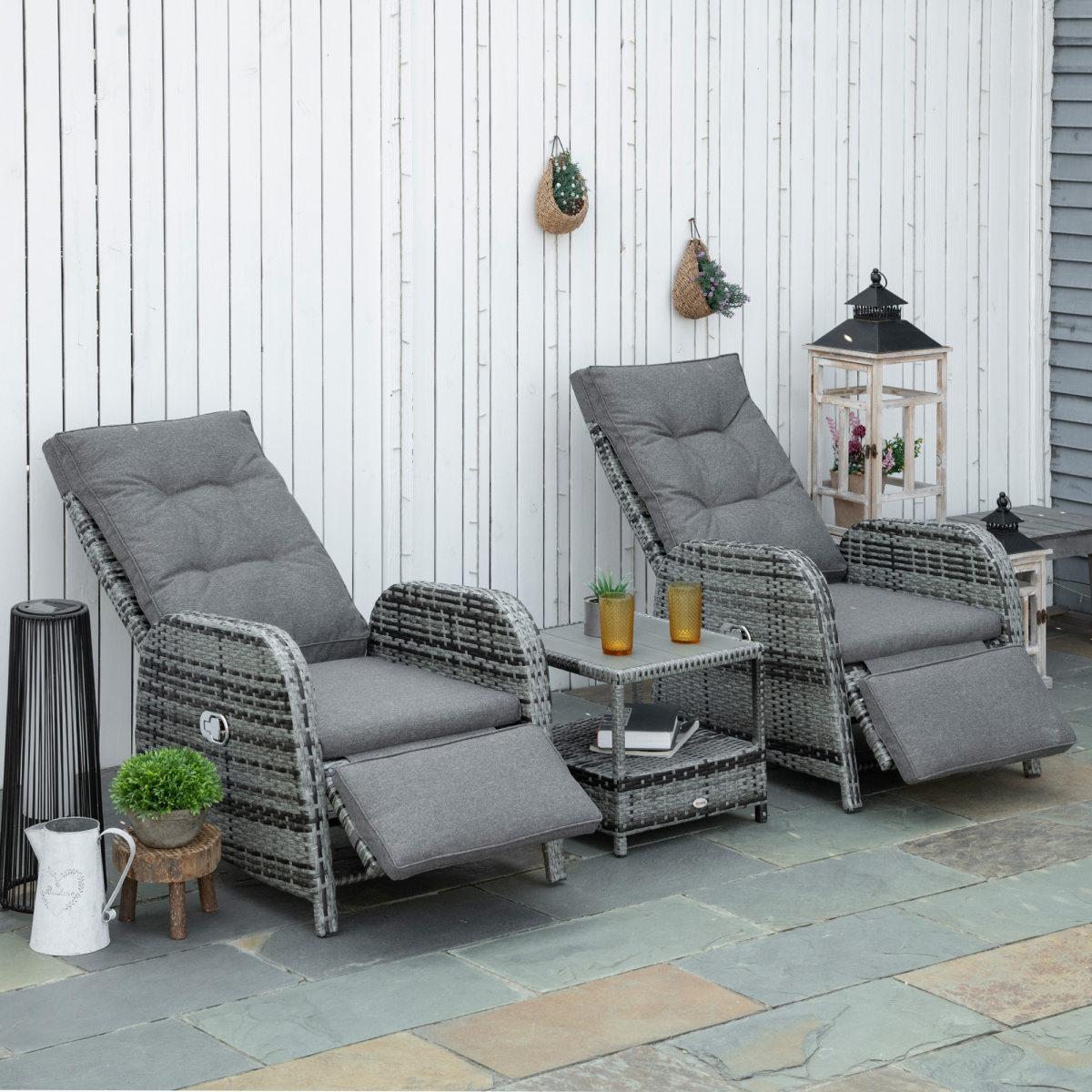 Outsunny rattan chaise lounge chair reclined with footrest raised