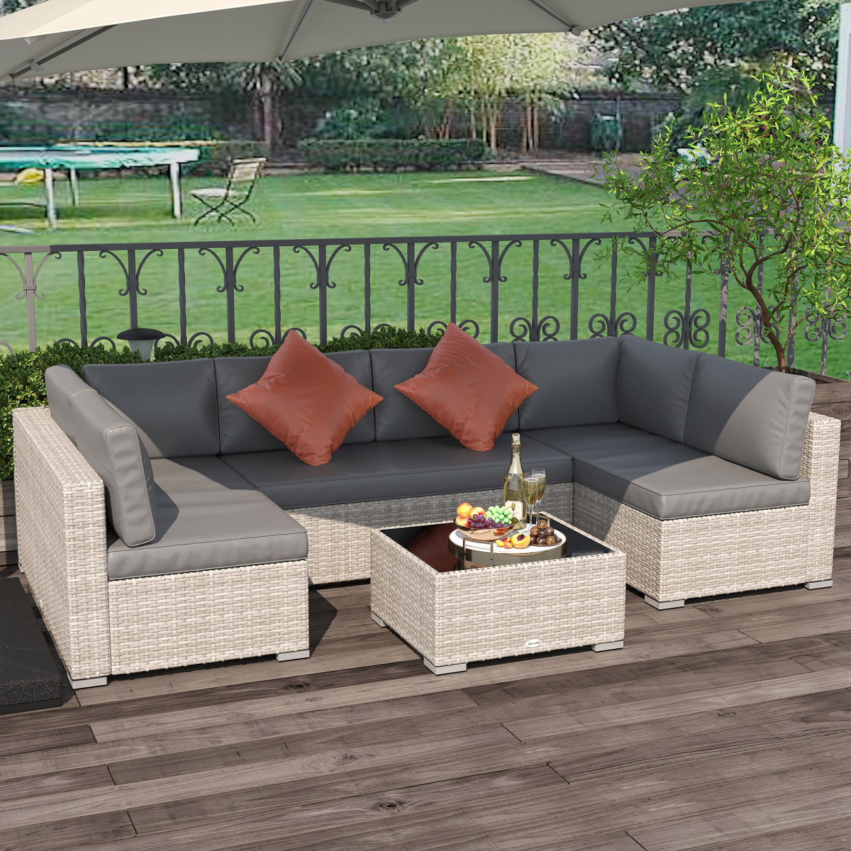 Outsunny Rattan Patio Sofa Set glass top table detail