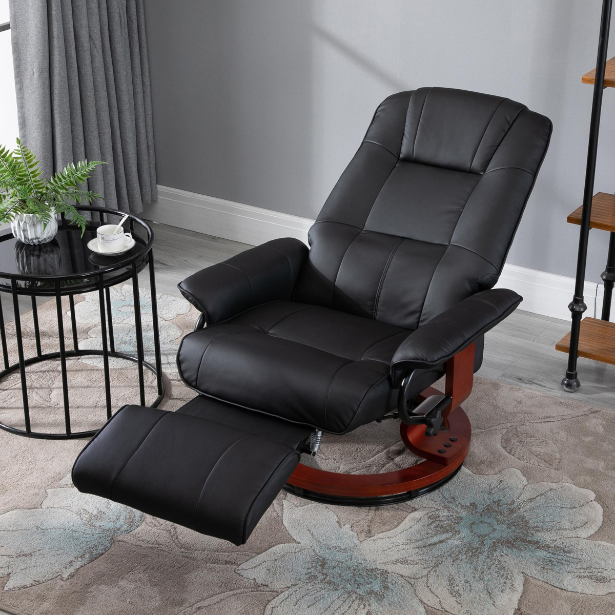 Black PU leather recliner armchair reclined with footrest raised