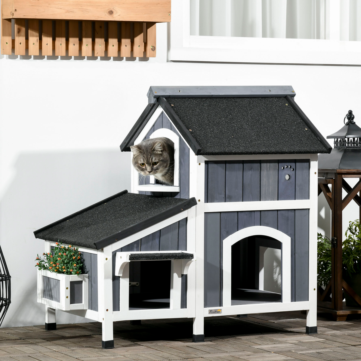 PawHut Wooden Outdoor Cat House with Flower Pot, Windows & Multiple Entrances – 2-Tier Weather-Resistant Shelter