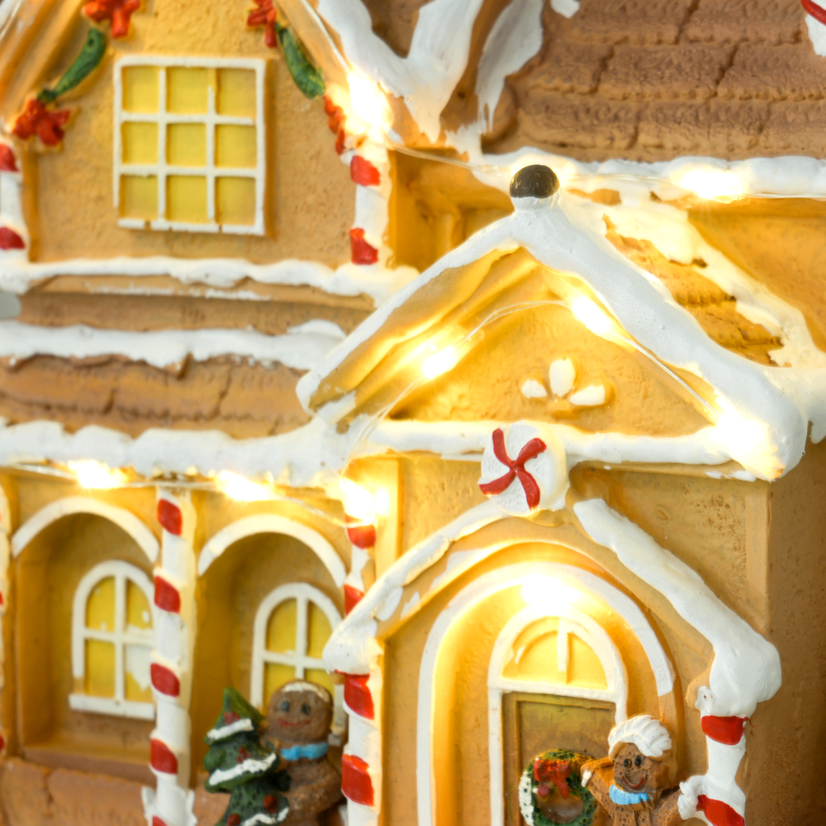 HOMCOM Lighted Musical Christmas Candy House with Gingerbread Man – 12 LED Lights, 8 Songs, Brown