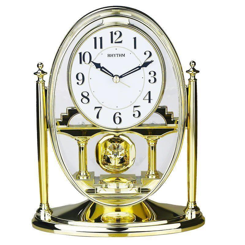 Rhythm gold pendulum mantel clock
