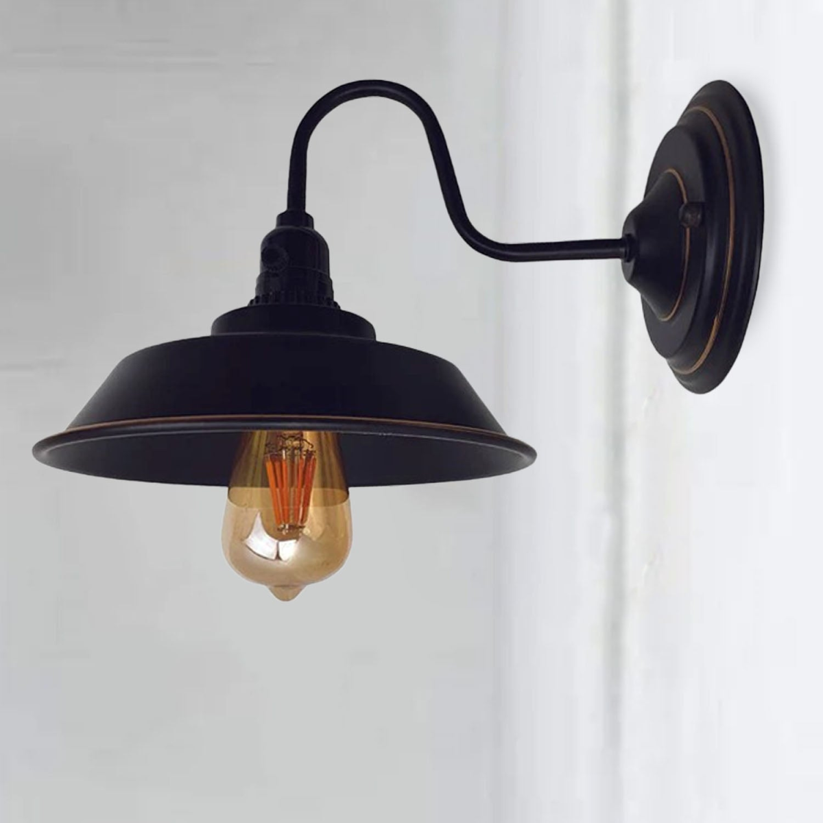 Black and gold wall sconce