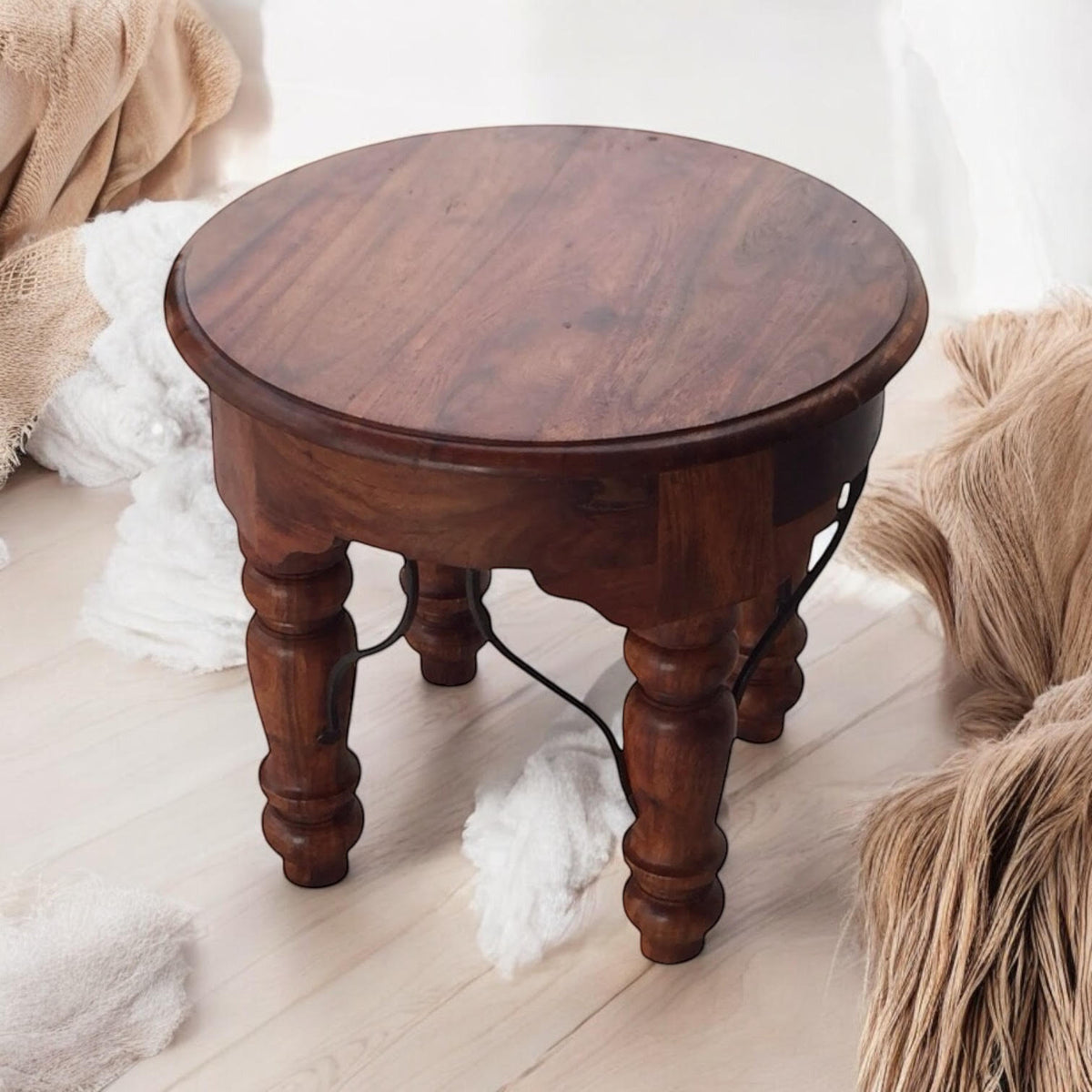 Deep brown round wooden dining table