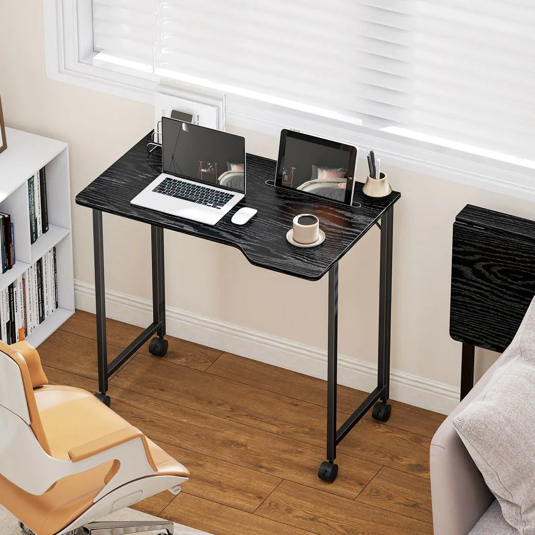 HOMCOM Folding Small Desk on Wheels – Space-Saving Computer Desk with Phone Slot, Black Wood Effect