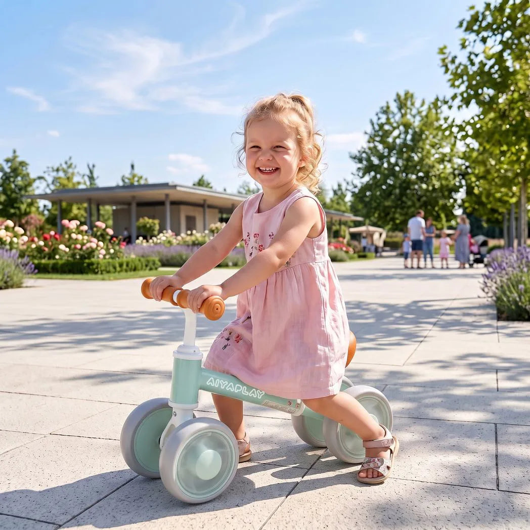 AIYAPLAY Baby Balance Bike for 1–2 Years with Four Light-up EVA Wheels and Adjustable Seat – Toddler Ride-On, Green