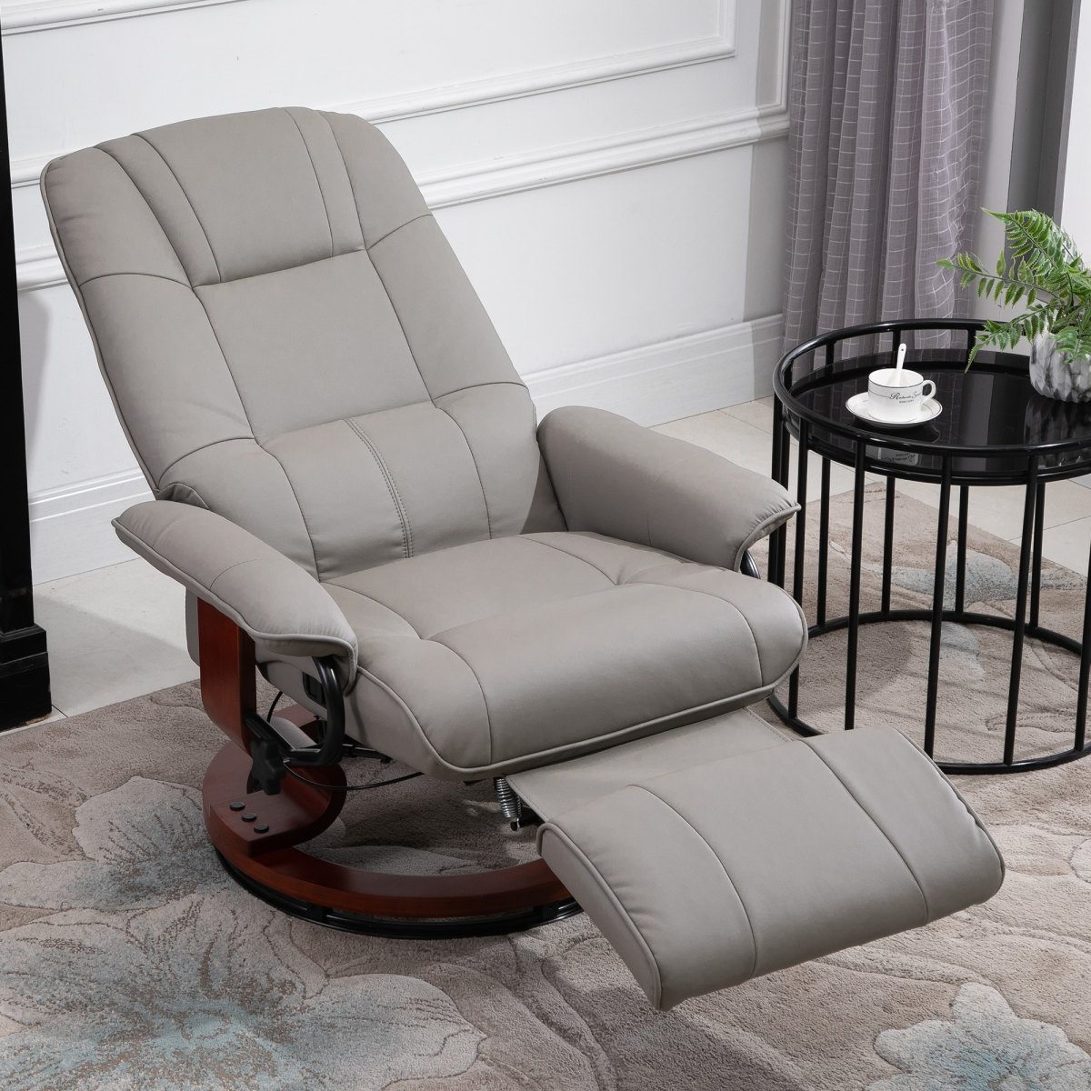 Grey PU leather recliner armchair reclined with footrest raised