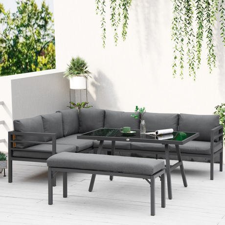 Outsunny aluminium garden dining set with glass table, styled outdoors