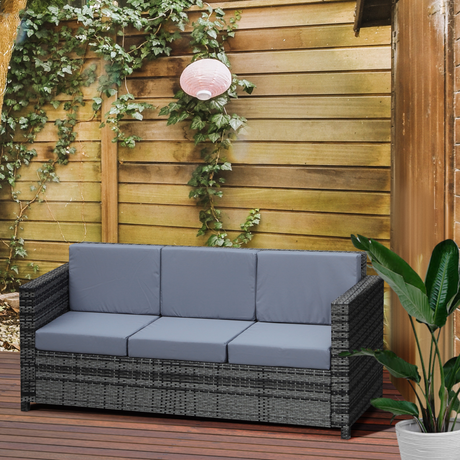 Outsunny rattan sofa arranged on a patio