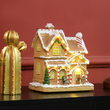 HOMCOM Lighted Musical Christmas Candy House with Gingerbread Man – 12 LED Lights, 8 Songs, Brown
