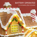 HOMCOM Lighted Musical Christmas Candy House with Gingerbread Man – 12 LED Lights, 8 Songs, Brown