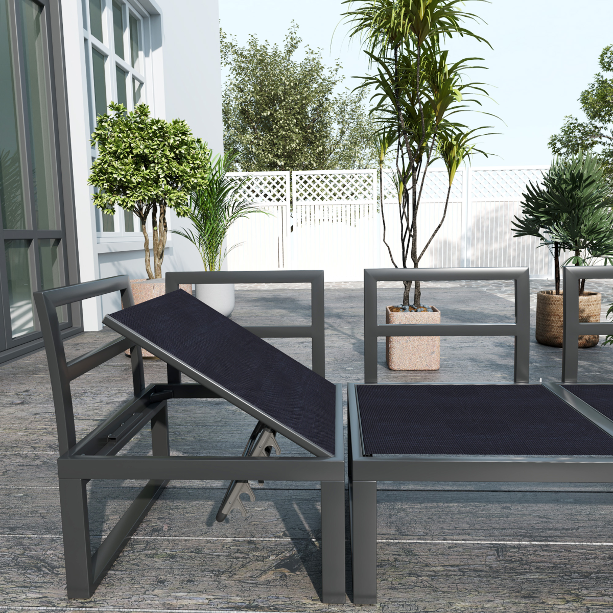 Outsunny 4-piece reclining corner garden sofa set on an outdoor patio with plants