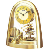 Rhythm gold rotating pendulum mantel clock