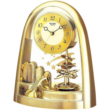 Rhythm gold rotating pendulum mantel clock