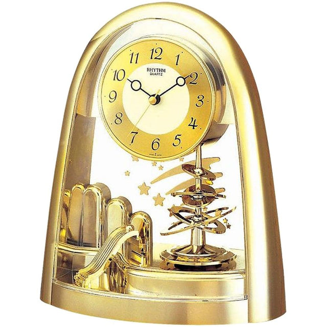 Rhythm gold rotating pendulum mantel clock