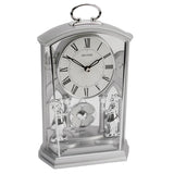 Rhythm Silver Mantel Clock with Swinging Pendulum & Two Footmen – Ornate Two-Tone Decorative Clock