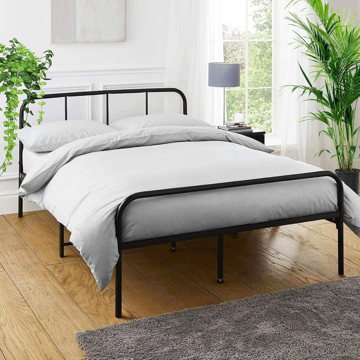 Extra strong black metal double bed frame with rounded head and footboard