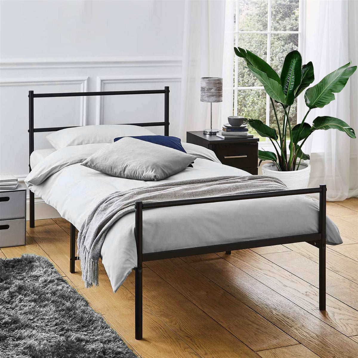Black single metal bed frame