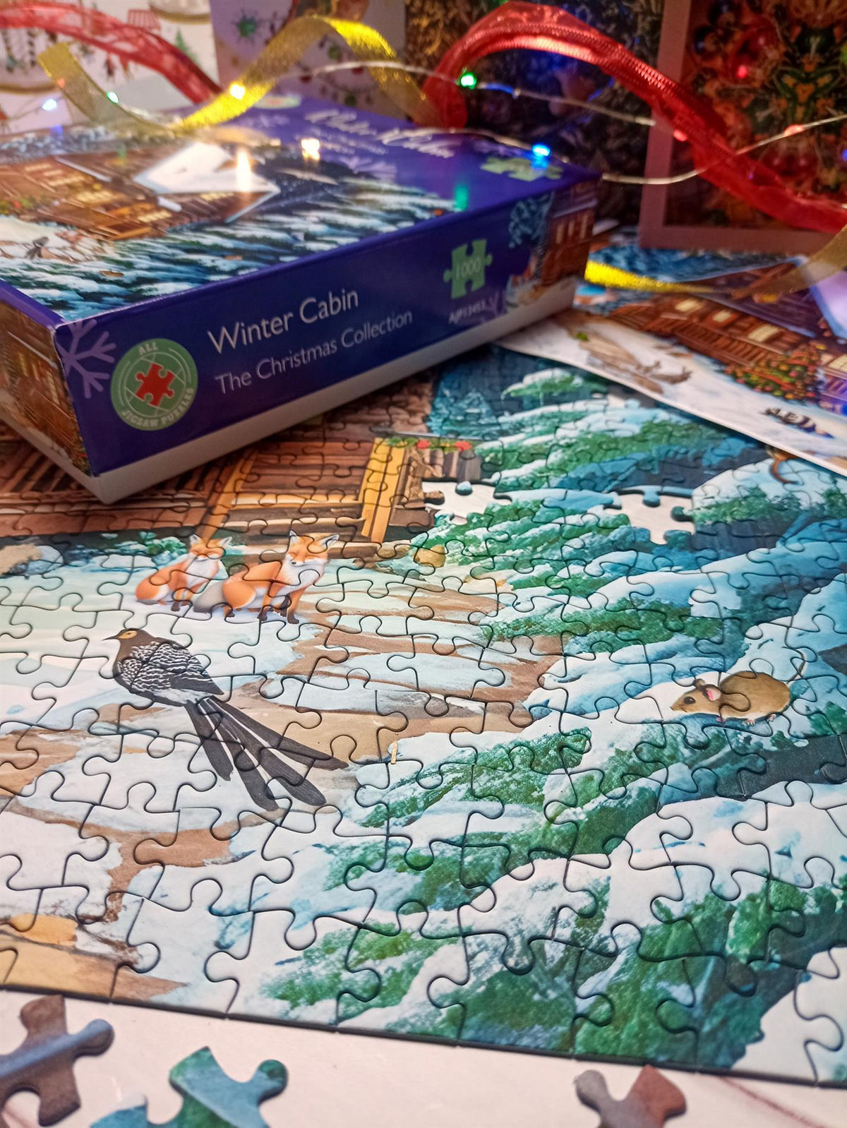 All Jigsaw Puzzles Winter Cabin 1000 Piece Jigsaw Puzzle – Snowy Woodland Scene with Festive Wildlife