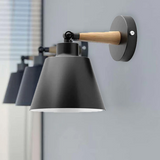 Black metal and wood wall sconce