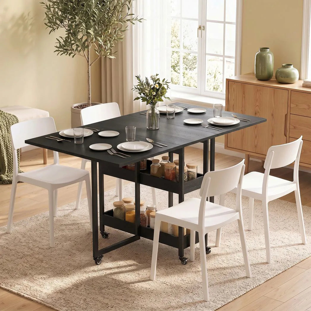 HOMCOM Drop Leaf Dining Table for 2–4 People with Open Shelves and Wheels – Folding Kitchen Table, Black