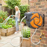 DURHAND 10m Wall-Mounted Auto-Rewind Garden Hose Reel with 7-Pattern Spray Nozzle, Orange