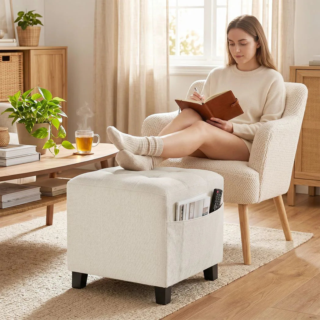 HOMCOM Small Ottoman Footstool with Side Pocket, Padded Seat and Rubber Wood Legs – Living Room, Beige