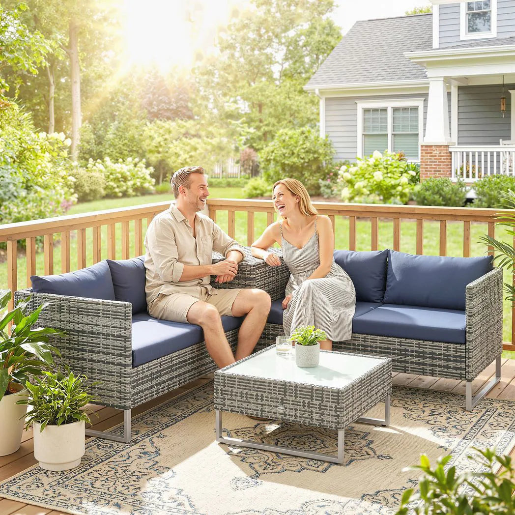 Outsunny 4 Piece Rattan Corner Sofa Set – Two Loveseats, Storage Table and Glass Coffee Table with Cushions, Dark Blue