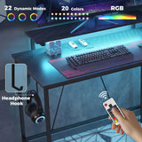 HOMCOM Reversible L-Shaped Gaming Desk with LED Lights, Monitor Stand & Power Outlets – Home Office, Black