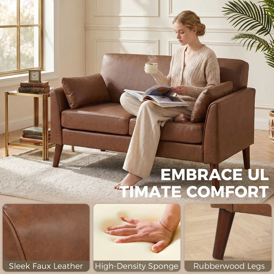 HOMCOM 2 Seater Sofa, 132 cm Small Loveseat with Solid Wood Legs and 2 Pillows – PU Leather Couch for Small Spaces, Brown