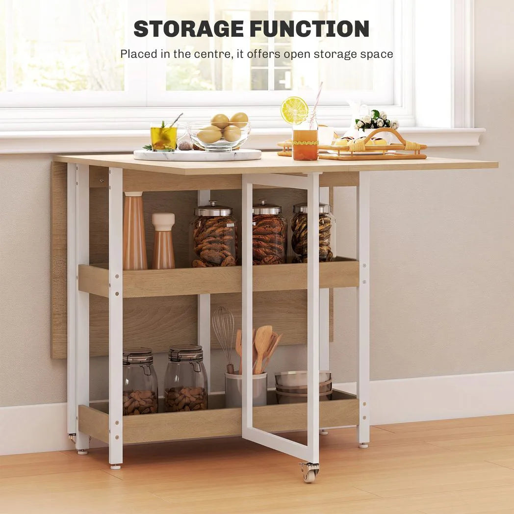 HOMCOM Four-Person Drop Leaf Dining Table with 2 Shelves and Wheels – Space-Saving, Wood-Effect