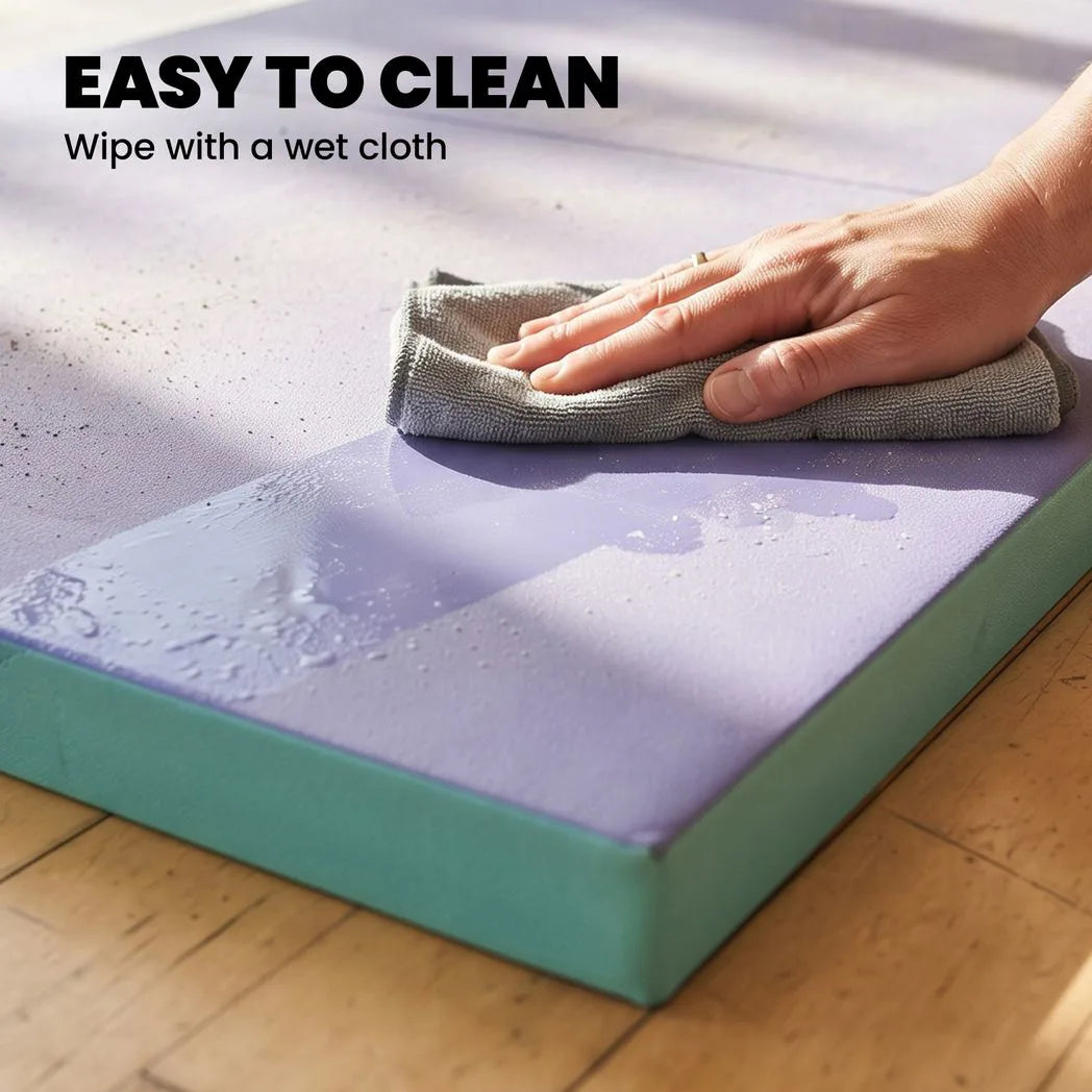 SPORTNOW Foldable Gymnastics Mat, 6 ft Long & 5 cm Thick with Handles – Four-Fold Tumbling Mat, Green & Purple