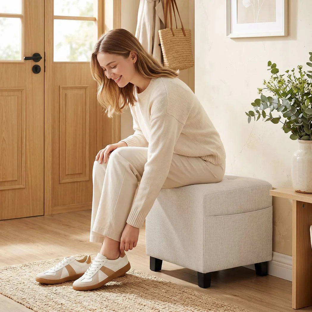 HOMCOM Small Ottoman Footstool with Side Pocket, Padded Seat and Rubber Wood Legs – Living Room, Beige