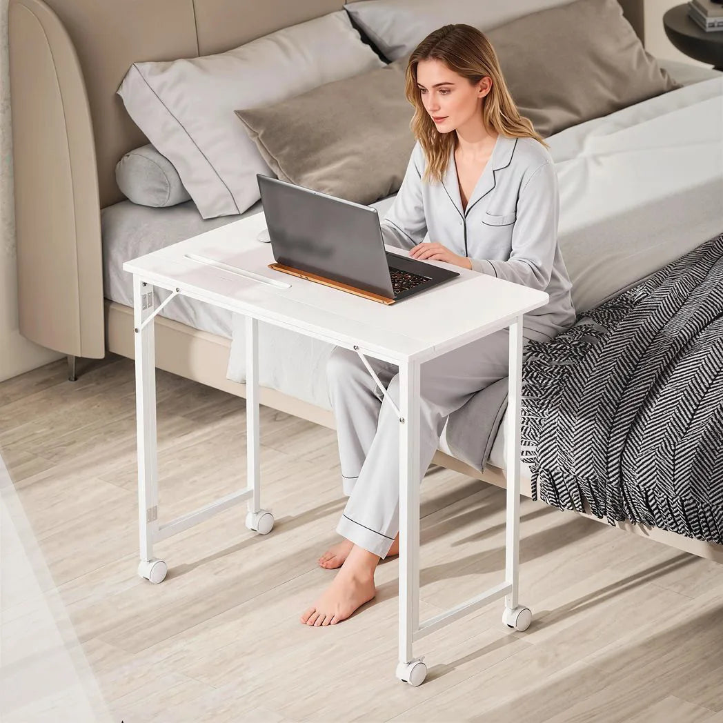 HOMCOM Small Folding Desk with 4 Lockable Wheels & Device Slot – Space-Saving Study Desk, White Wood-Effect