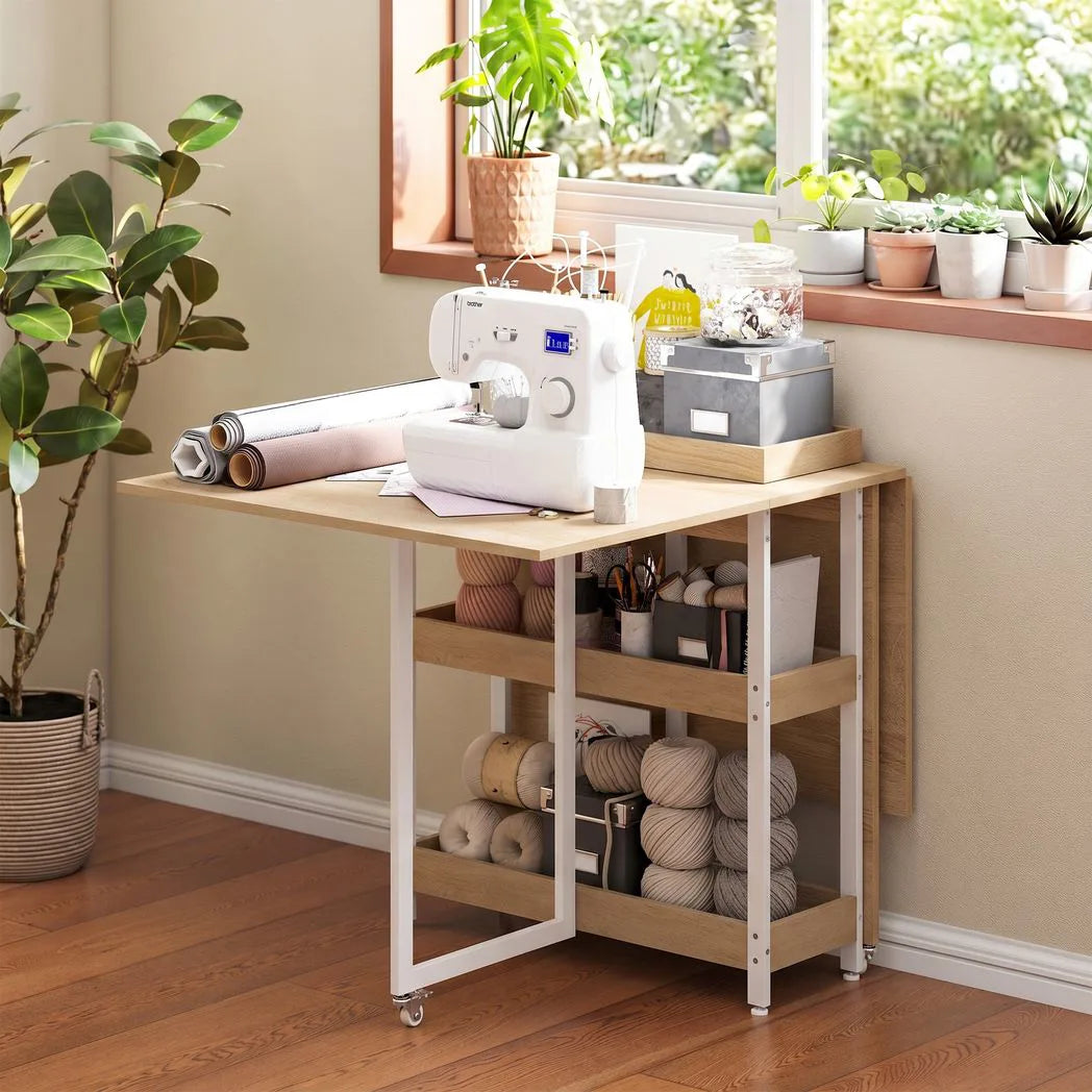 HOMCOM Four-Person Drop Leaf Dining Table with 2 Shelves and Wheels – Space-Saving, Wood-Effect