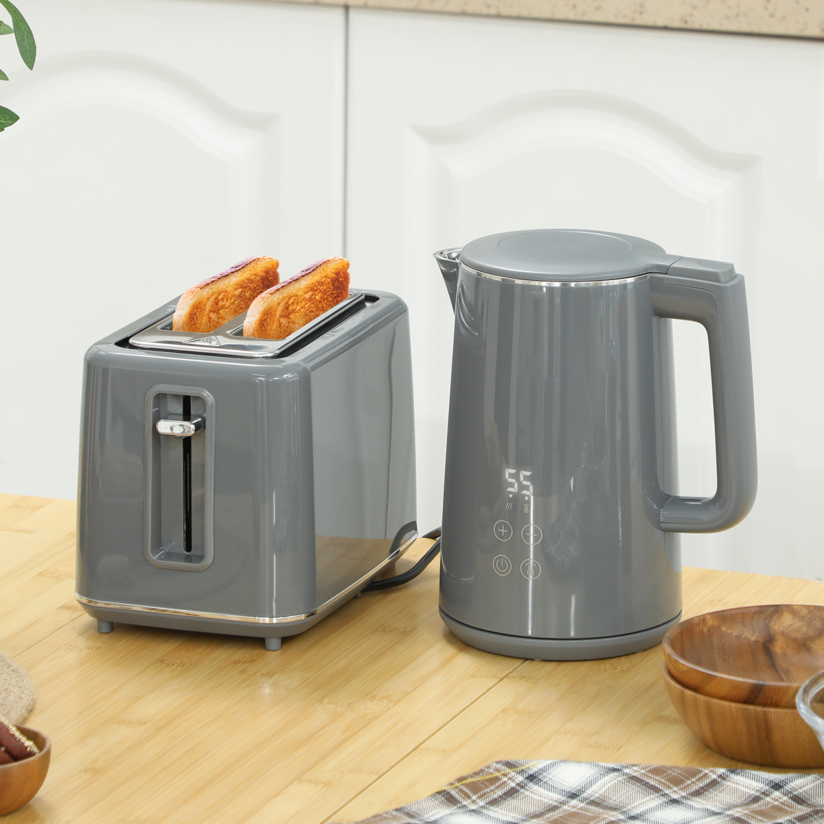Stainless steel and grey kettle and toaster set