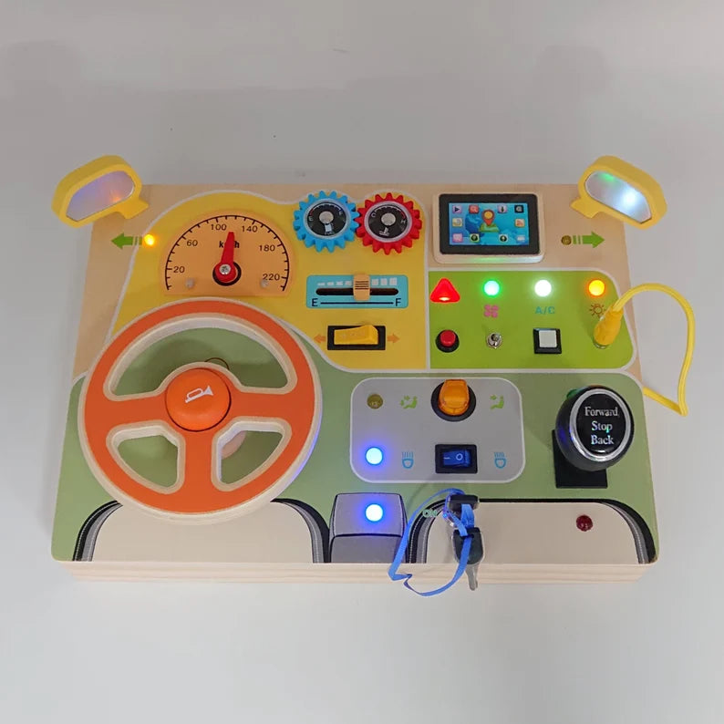Montessori Wooden Busy Board with Steering Wheel, LED Lights, Engine Sounds & Key Turn – Toddler Sensory Toy